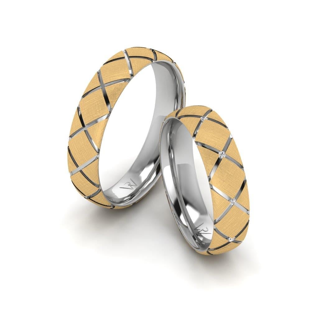 Eheringe mit Twinklefy-Steinen aus Weißgold und gelbem Kristall von Dalloz