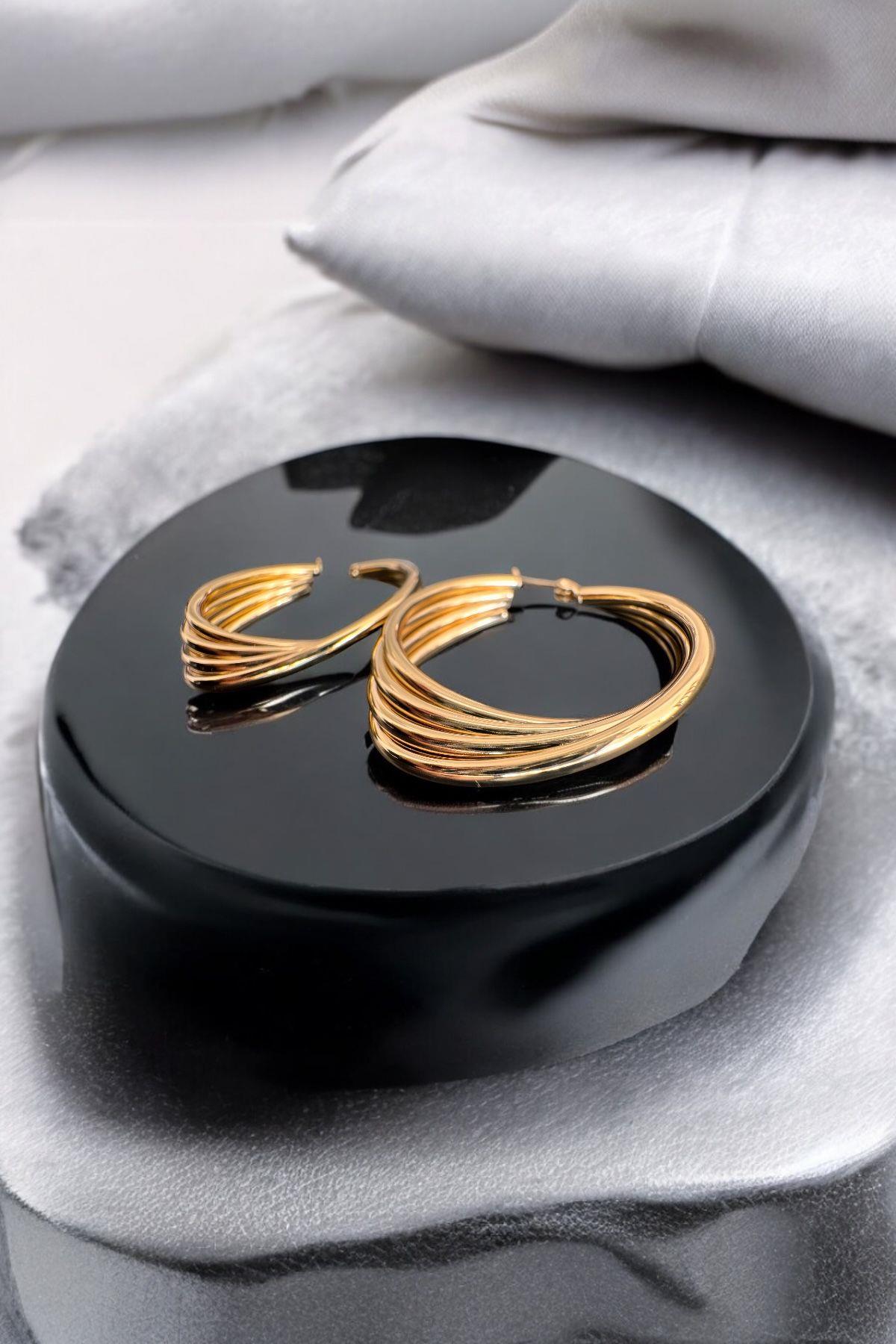 Çelik Gold Kıvrımlı Şık Halka Küpe Gold