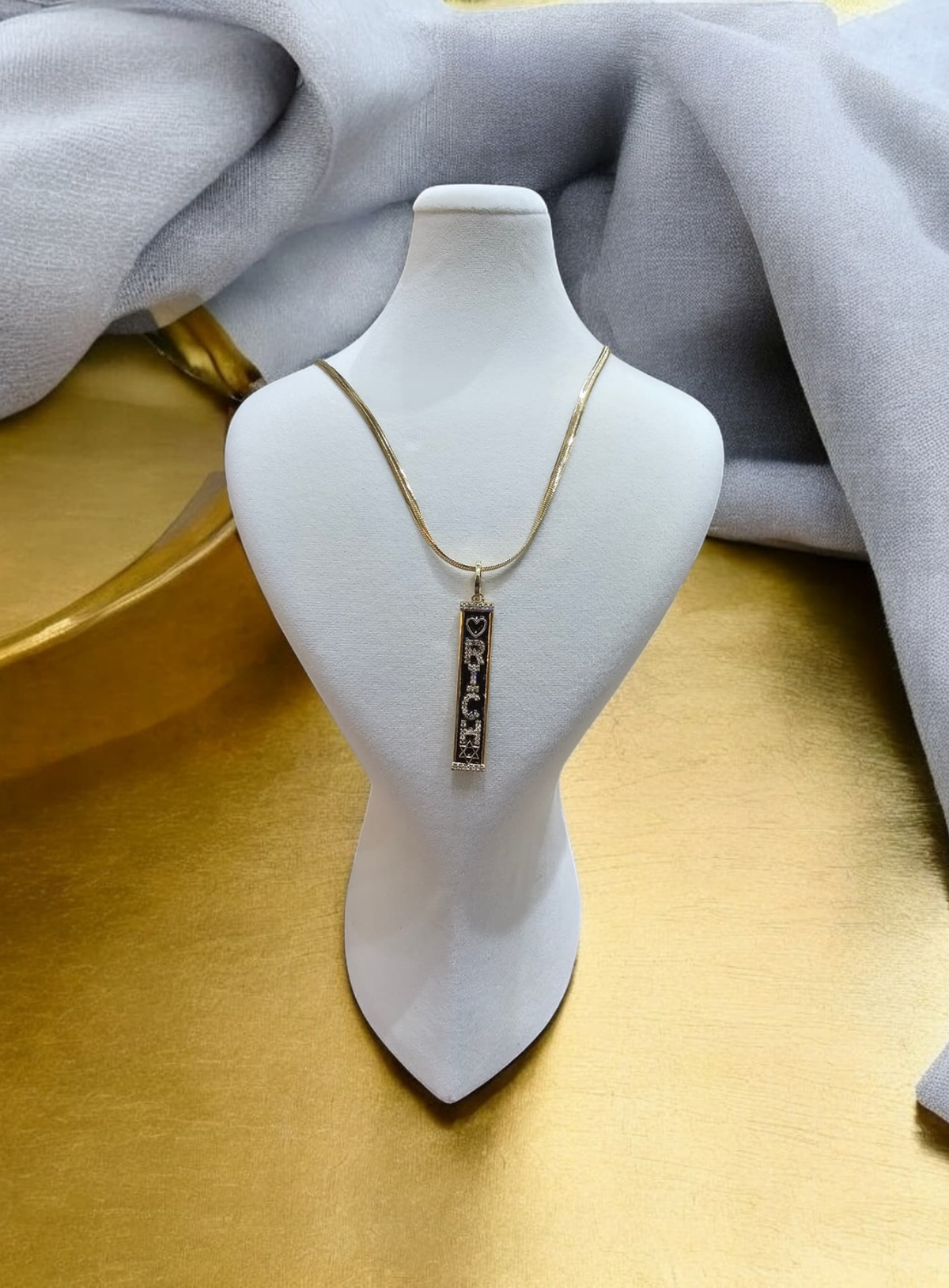 Çelik Şans Kolyesi