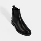 Kadın Siyah Metal Toka Detaylı Fermuarlı Deri Bot