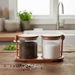 Deconox Akasya Standlı Kapaklı Kaşıklı 2'li Cam Baharat ve Tuzluk Seti | Hava Geçirmez Doğal Ahşap Kapaklı Baharatlık | Modern Masaüstü Tuzluk Biberlik Seti | Kahve, Şeker, Bitki Kavanozu