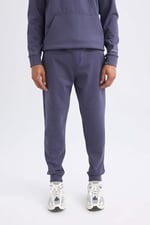 DeFacto DeFactoFit Standart Fit Beli Bağcıklı Lastikli Paça Skuba Dalgıç Kumaş Jogger Eşofman Altı Mor XL