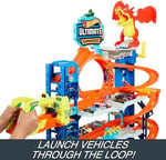 Hot Wheels 2 adet metal araba ile birlikte gelen, 50'den fazla 1:64 ölçekli araba için saklama alanına sahip, 4 katlı oyun pisti içeren Hot Wheels Şehri Yeni Ultimate Garaj ile ejderhayı yen, HKX48