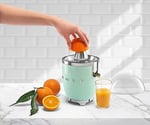Smeg CJF11PGEU narenciye sıkacağı, pastel yeşil