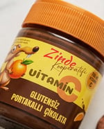 ZİNDE KOOP. GLUTENSİZ KEÇİBOYNUZLU - PORTAKALLI ÇİKOLATA 300 GR