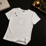 BYMN BEYAZ KABARTMALI DESEN VE TAŞ DETAYLI KADIN TSHIRT 