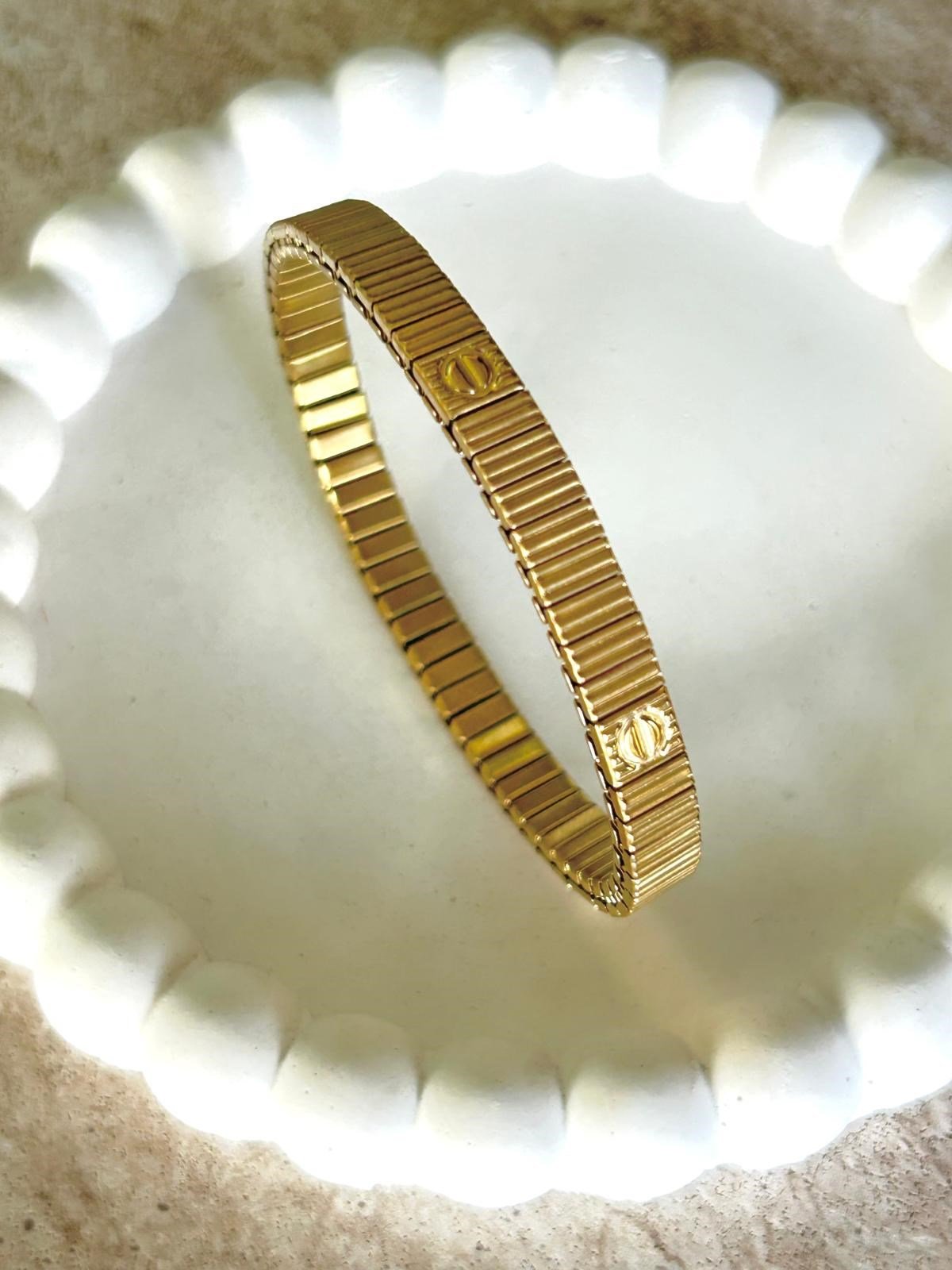 Marka Model Lastikli Çelik Gold Bileklik (6mm)