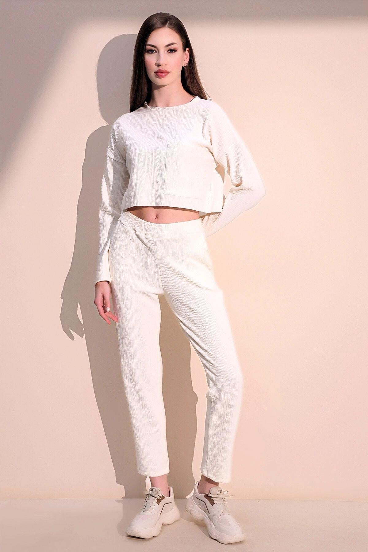 ekru-yumusak-dokulu-pantolon-d62e13.jpg