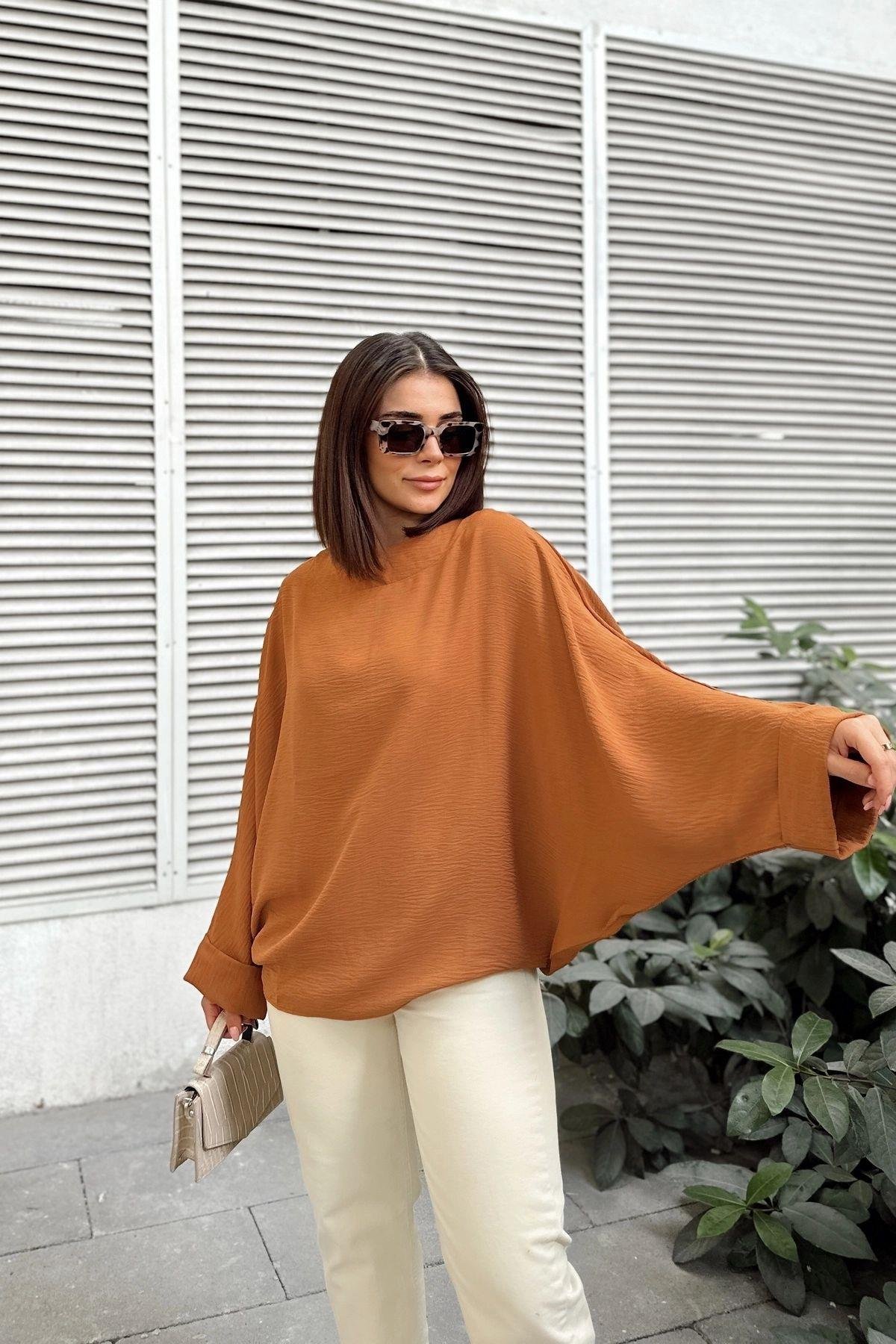 taba-airobin-salas-bluz-c-b3d3.jpg