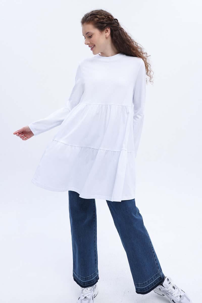 سترة من القطن الأبيض المجمعة