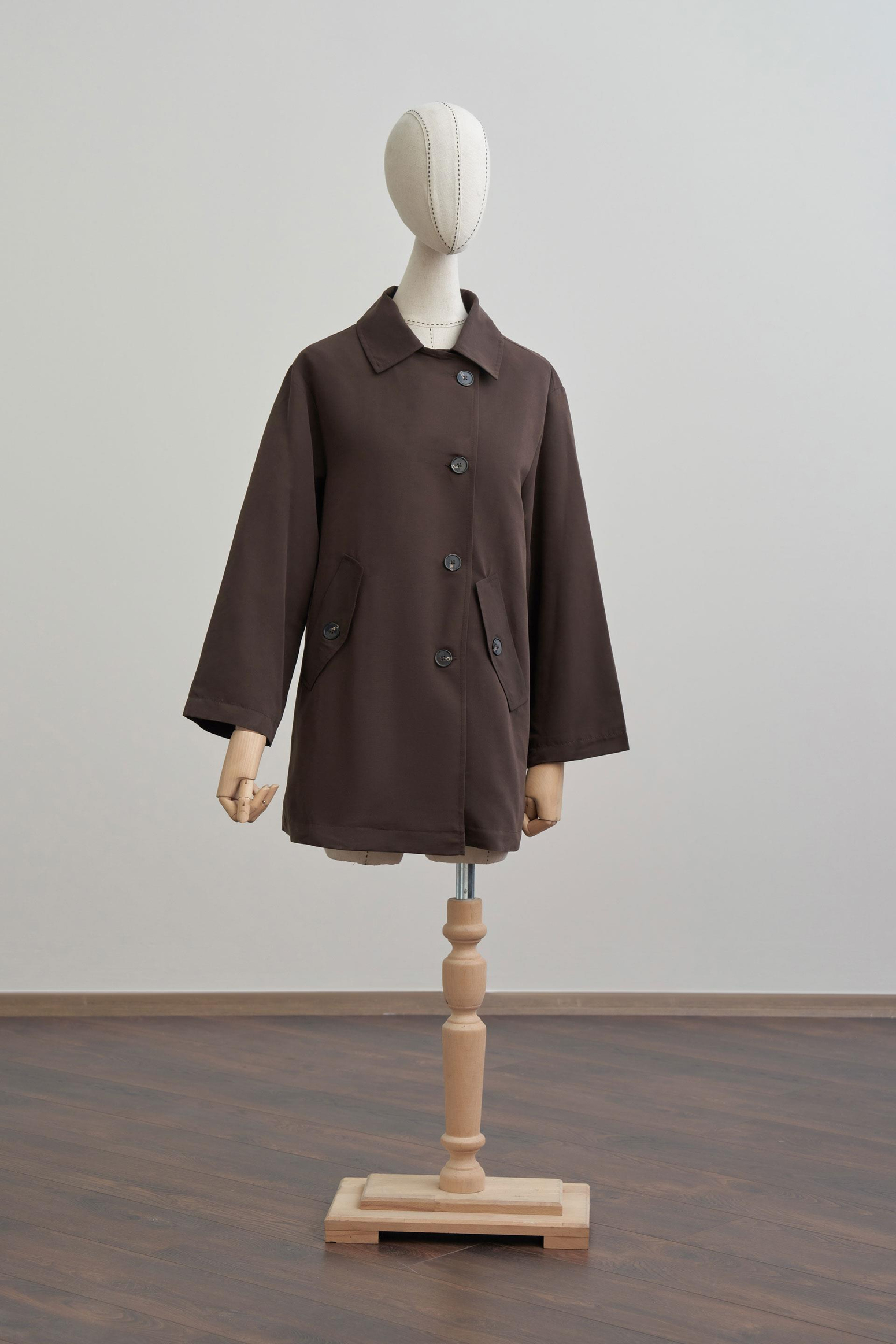 Acı Kahve-Asimetrik Düğmeli Arkası Pileli Trençkot