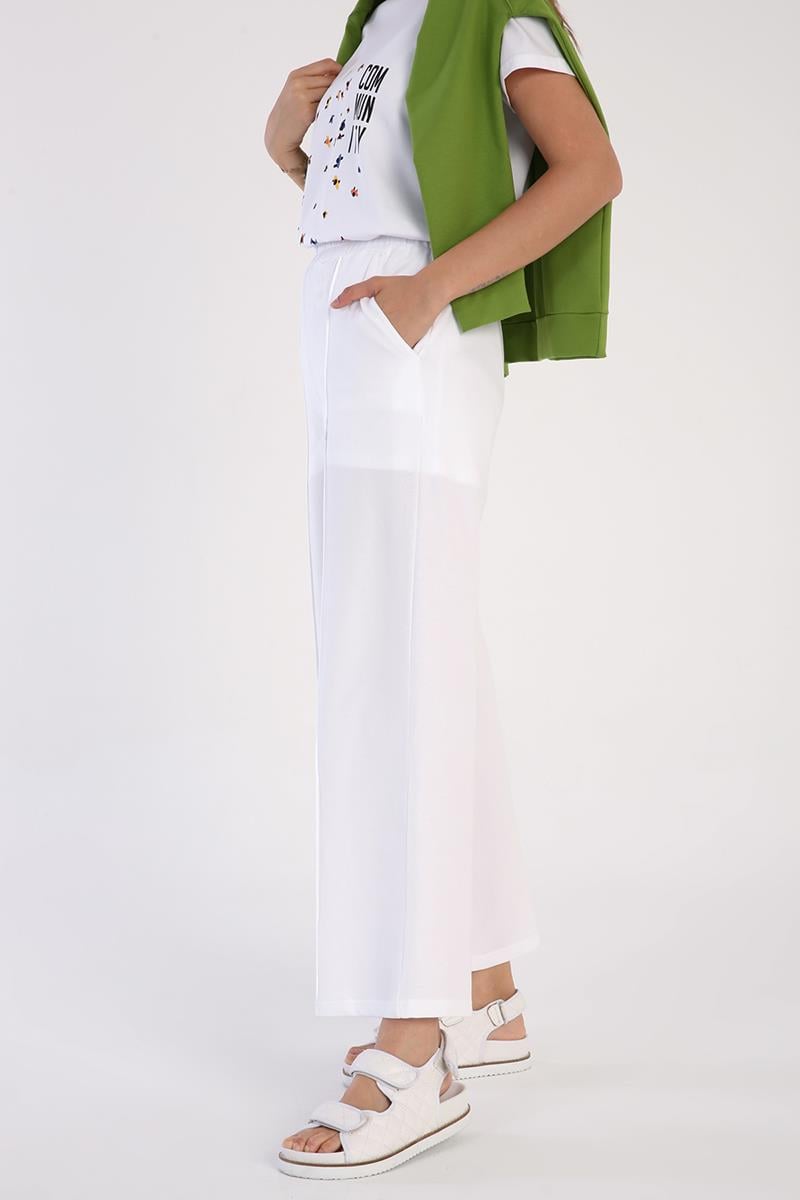 Weiß-graue Jogginghose mit weitem Bein und Taschen