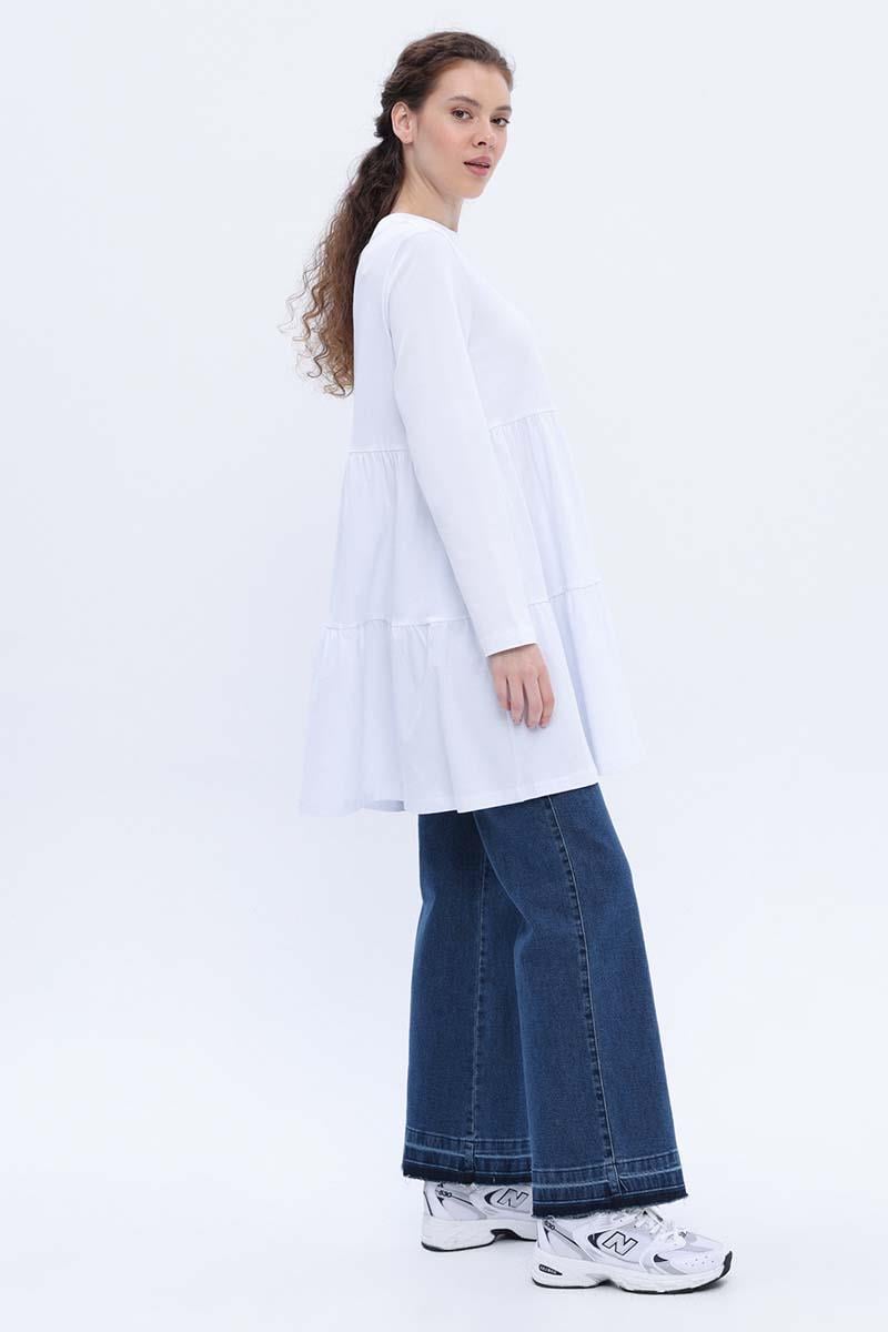 سترة من القطن الأبيض المجمعة