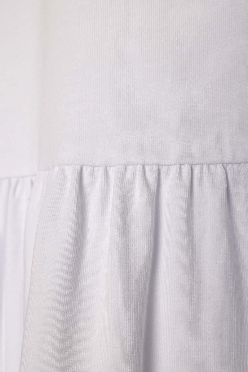 سترة من القطن الأبيض المجمعة