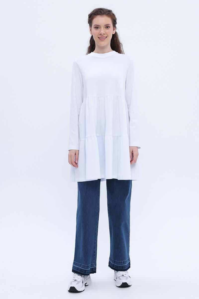 سترة من القطن الأبيض المجمعة