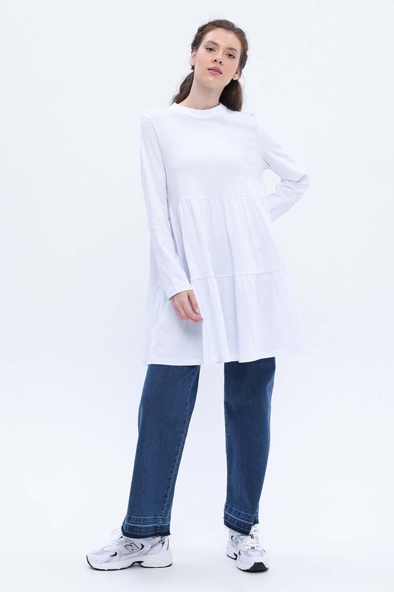 سترة من القطن الأبيض المجمعة