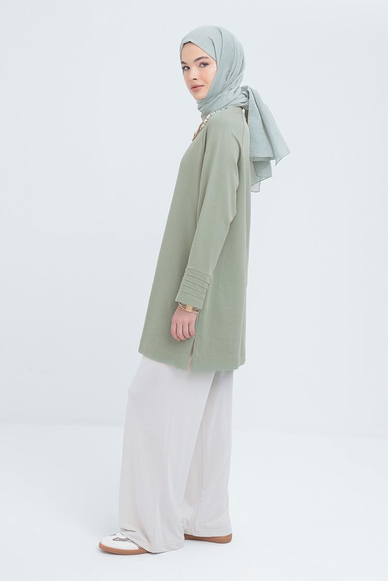 Defne-Manşeti Nervür Detaylı Yırtmaçlı Tunik