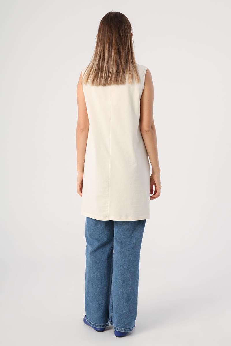 Ärmellose Tunika mit Kragenpaspelierung aus Ecru-Baumwolle