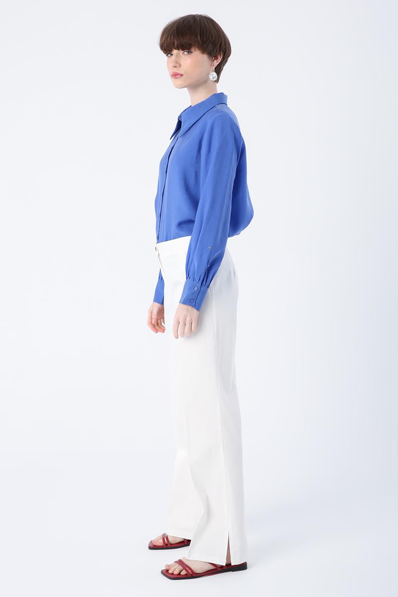 Kırık Beyaz-Pamuklu Ütü İzli Paçası Yırtmaçlı Likralı Bol Paça Pantolon