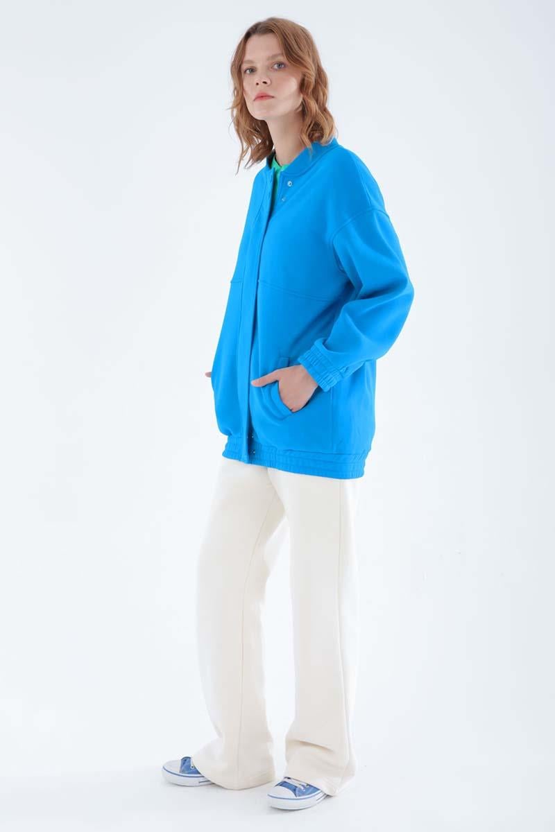 Cardigan zippé bleu à boutons-pression
