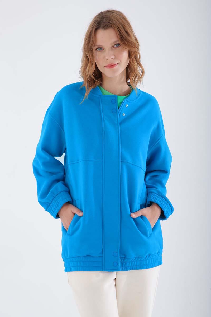 Cardigan zippé bleu à boutons-pression