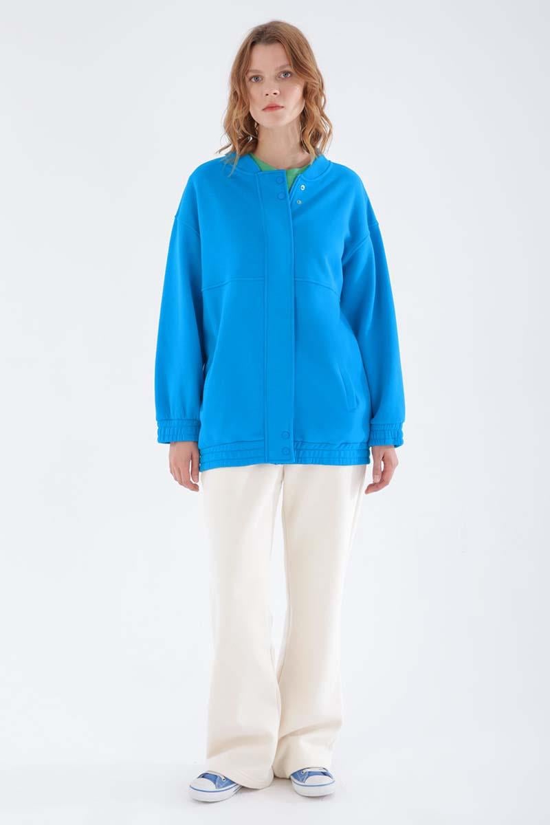 Cardigan zippé bleu à boutons-pression