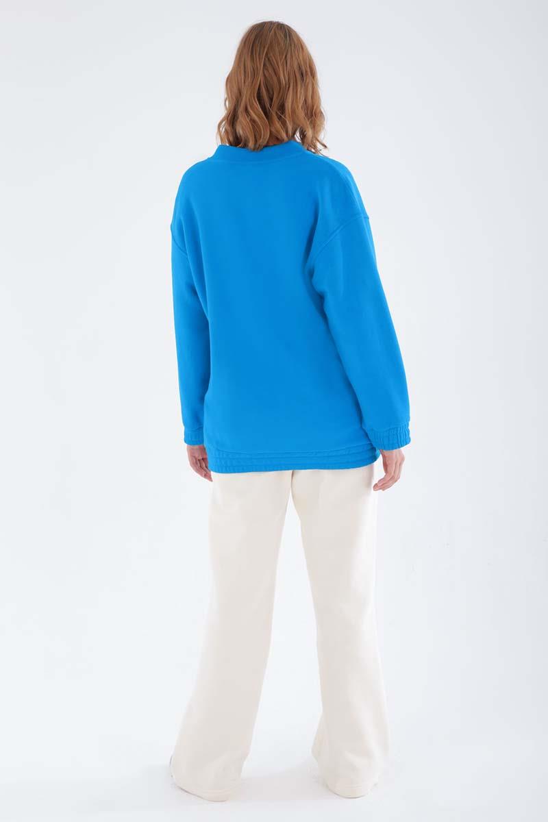Cardigan zippé bleu à boutons-pression