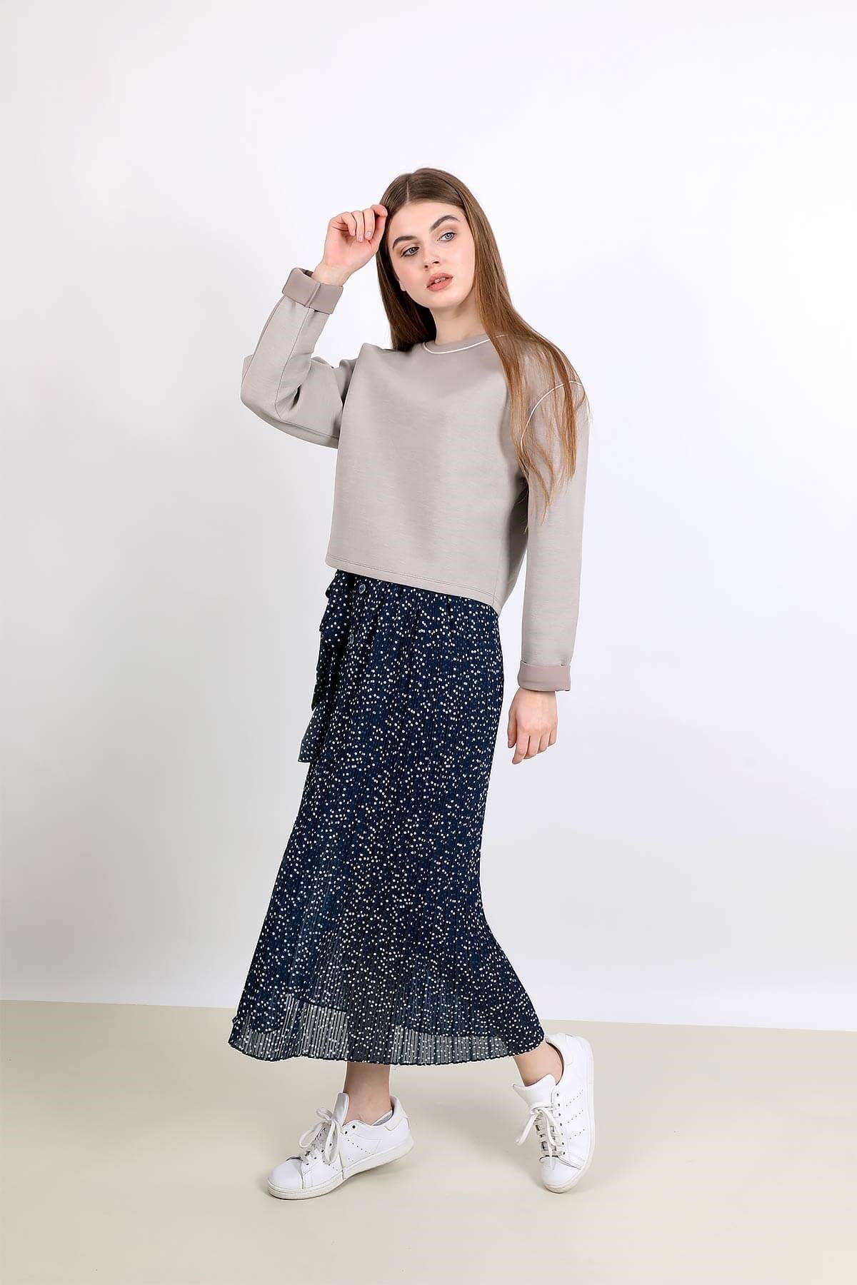 Lacivert puantiyeli pilili beli lastikli astarlı midi etek ve diğer Etek modellerimiz için online alışveriş mağazamızı ziyaret edin. 