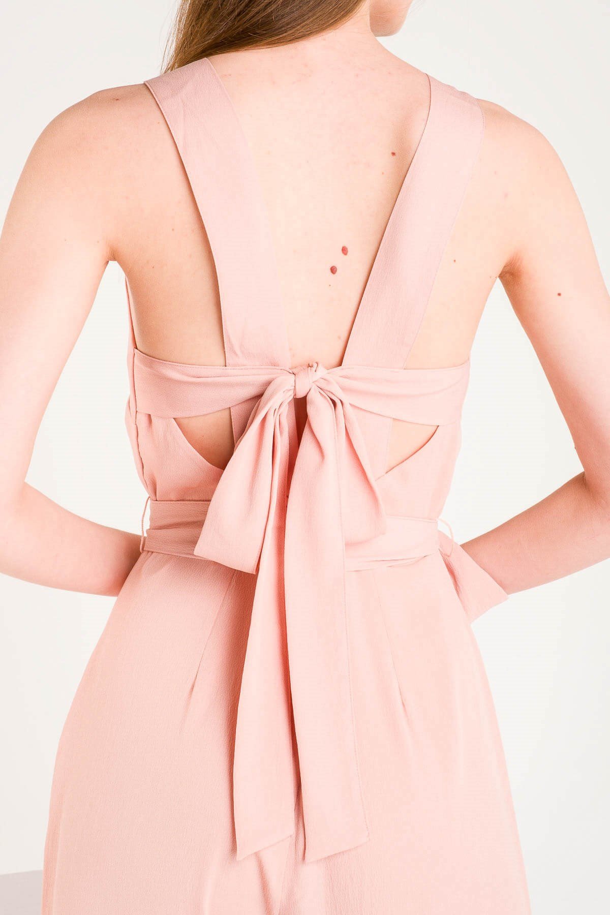 Pembe Sırtı Bağlama Detaylı Kuşaklı Tulum ve diğer Tulum modellerimiz için online alışveriş mağazamızı ziyaret edin. 