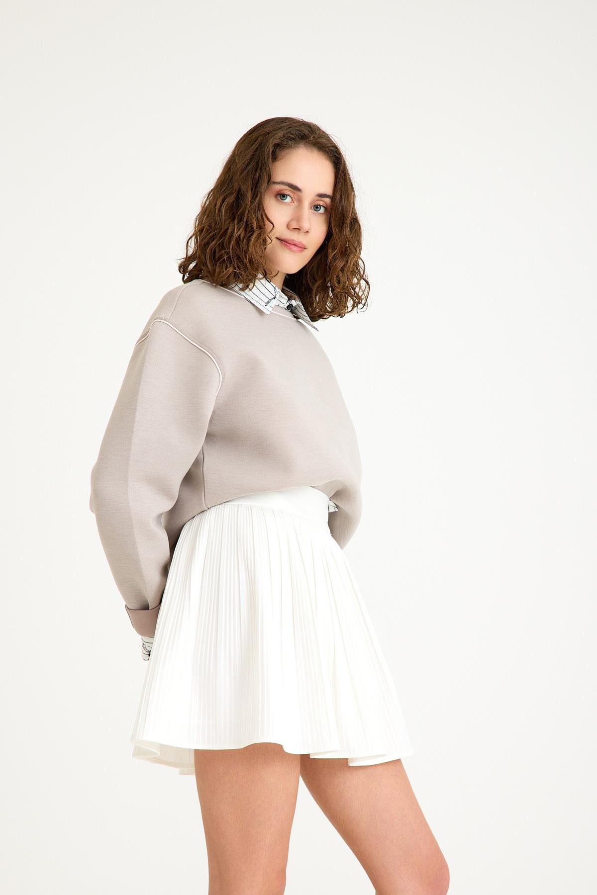 Pilili İçi Şortlu Etek - Beyaz ve diğer Etek modellerimiz için online alışveriş mağazamızı ziyaret edin. 