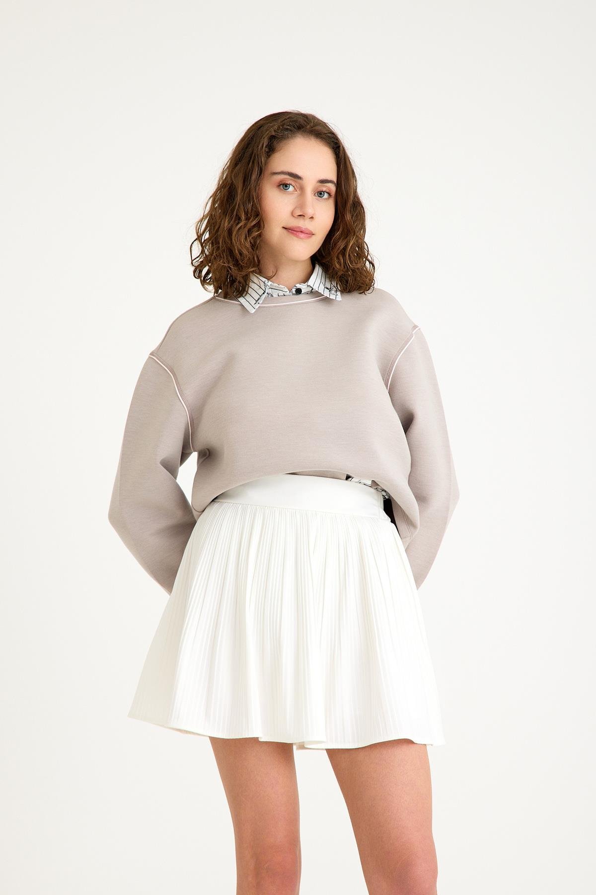 Pilili İçi Şortlu Etek - Beyaz ve diğer Etek modellerimiz için online alışveriş mağazamızı ziyaret edin. 