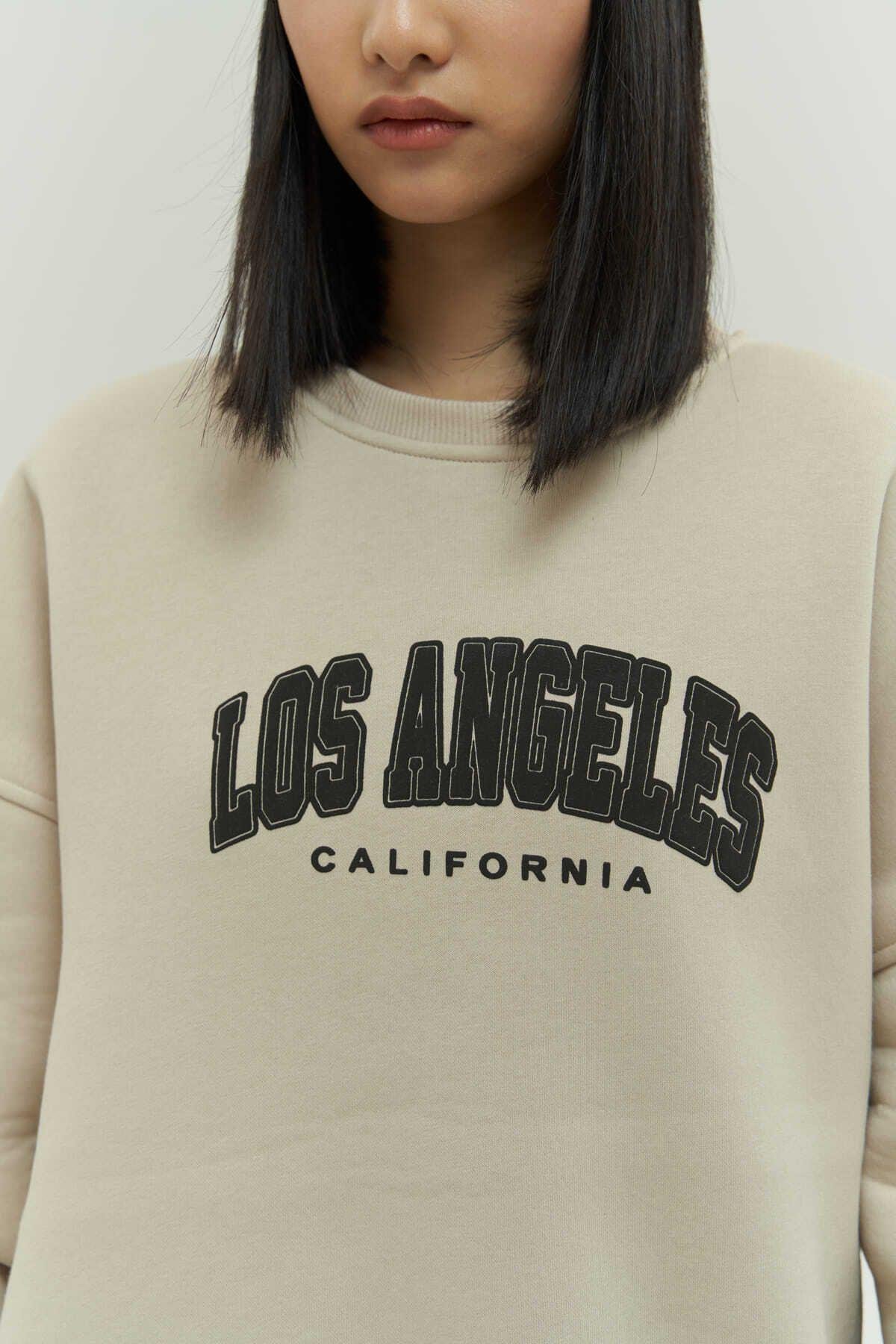 MCLLCTN Los Angeles Bone Track Suit