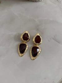 Marka Model Kahverengi Gold Kenarlı Sallantılı Küpe