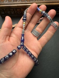 Basık Model Gümüş İşlemeli Ateş Kehribar Tesbih