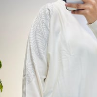 TIĞ TRİKO OMZU YAPRAK TAŞ BASKILI TUNİK VANİLYA