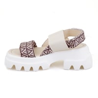 Kadın Bej Monogram Desenli Dolgu Topuklu Sandalet