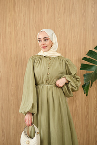 Asimetrik Fırfırlı Bel Bağlamalı Piliseli Elbise Fıstık Yeşil