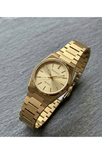 Milano Kadın Kol Saati 26 mm Altın Renk Minimal Şık Çelik Kordon Quartz