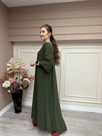 Noi 53222 Koyu Yeşil Krep Jarse Kolları Manşetli A Form Elbise