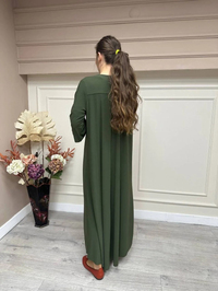 Noi 53222 Koyu Yeşil Krep Jarse Kolları Manşetli A Form Elbise