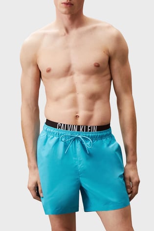 Calvin Klein Calvin Klein Erkek Beli İp Bağlamalı ve Lastikli Hızlı Kuruyan Normal Kesim Mavi Şort KM0KM01093-CVJ