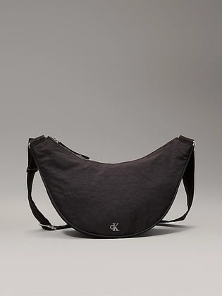 Calvin Klein Calvin Klein Kadın Ayarlanabilir Omuz Askılı Fermuarlı İç Bölmeli Metalik Ck Logolu Siyah Omuz Çantası LV04K3095G-UB1