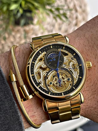 TASARIM ÖDÜLLÜ GOLD RENK KOL SAATİ - 316L ÇELİK KASA VE HARDLEX MİNERAL CAM - TASARIM ÖDÜLLÜ JAPON MIYOTA (OTOMATİK) MEKANİZMALI SAATSAAT KONSEPT WATCHOFROYALGENEVEWTASARIM ÖDÜLLÜ GOLD RENK KOL SAATİ - 316L ÇELİK KASA VE HARDLEX MİNERAL CAM - TASARIM ÖDÜLLÜ JAPON MIYOTA (OTOMATİK) MEKANİZMALI SAAT