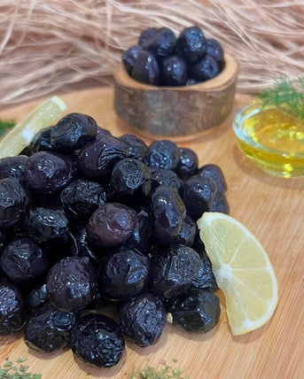 SPECİAL SİYAH ZEYTİN 500 GRAM görseli.