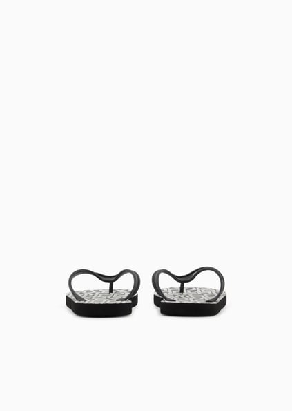 ARMANI EXCHANGE Armani Exchange Unısex Düz ve Rahat Taban Marka Logo Dokulu Parmak Arası Siyah-Beyaz Terlik XUQ002 XV676-N814