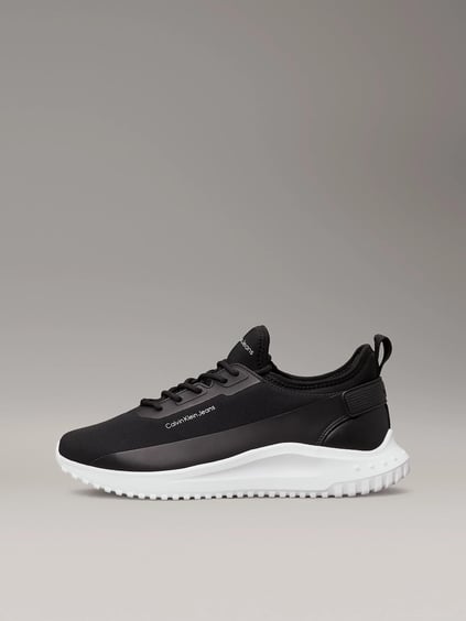CALVIN KLEIN Calvin Kleın Erkek Rahat Yüksek Taban Kumaş Detaylı Deri Siyah Sneaker YM0YM01170-0GM