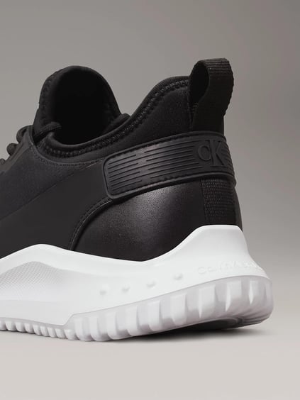 CALVIN KLEIN Calvin Kleın Erkek Rahat Yüksek Taban Kumaş Detaylı Deri Siyah Sneaker YM0YM01170-0GM