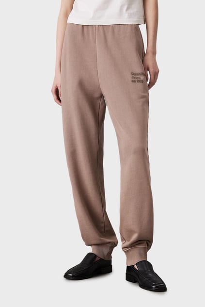 Calvin Klein Calvin Klein Kadın Normal Kesim Geniş Paça Dokuma Kumaş Beli ve Paçası Lastikli Bej Eşofman Altı J20J224989-PFW