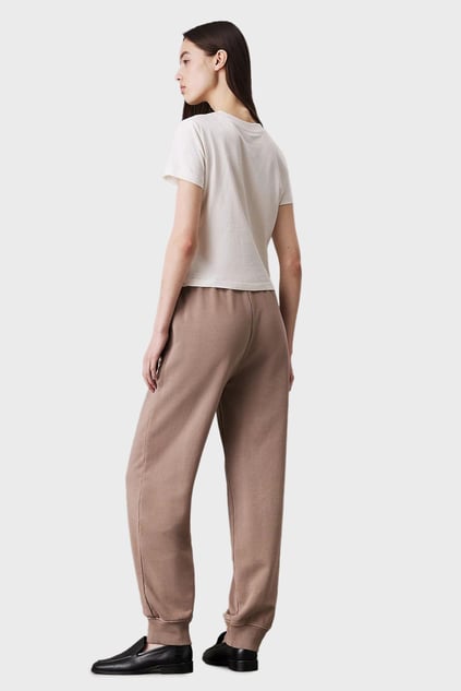 Calvin Klein Calvin Klein Kadın Normal Kesim Geniş Paça Dokuma Kumaş Beli ve Paçası Lastikli Bej Eşofman Altı J20J224989-PFW