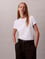 Calvin Klein Kadın Normal Kalıp %100 Pamuklu CK Logo Detaylı Kısa Kollu Beyaz T-Shirt LV047D873G-YAA